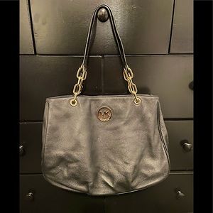 Michael Kors black leather with gold link strap tote